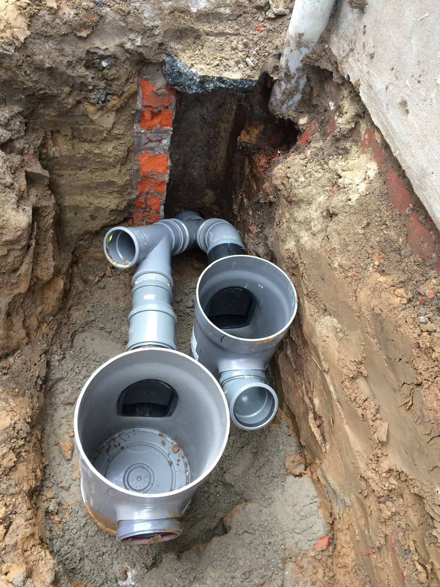 Rioleringswerken met inspectieputten